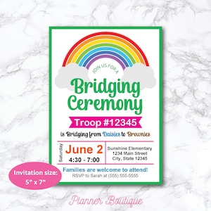 May include: A green and pink invitation with a rainbow and clouds. The text reads "Join us for a Bridging Ceremony Troop #12345 is Bridging from Daisies to Brownies". The date is June 2nd, 4:30-7:00. The location is Sunshine Elementary, 1234 Main Street, City, State 12345. The invitation size is 5" x 7".