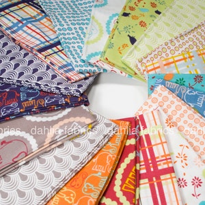 May include: A collection of colorful fabric squares with various patterns, including polka dots, stripes, and geometric designs. The fabrics are arranged in a circle, with the text "dahlia fabrics" visible at the bottom.