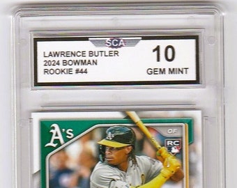 May include: A baseball card featuring Lawrence Butler, a rookie player for the Oakland Athletics. The card is graded 10, Gem Mint, by the Sportscard Guaranty Corporation (SGC). The card features a photo of Butler in his A's uniform, batting with a baseball bat. The card is green and white with the A's logo and the text "Lawrence Butler, Oakland Athletics".