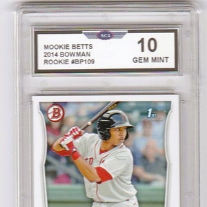 May include: A baseball card featuring Mookie Betts, a professional baseball player. The card is graded Gem Mint 10 by the Sportscard Guaranty Corporation (SGC). The card features a photo of Betts in a Boston Red Sox uniform, swinging a bat. The card is from the 2014 Bowman Rookie set and is numbered BP109.