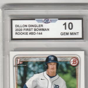 May include: A Dillon Dingler baseball card from the 2020 First Bowman Rookie series, graded a 10 Gem Mint by SCA. The card features a color image of Dingler in a Detroit Tigers uniform.