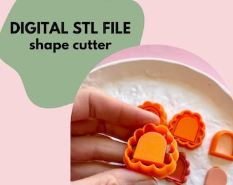 May include: A set of orange plastic cookie cutters in the shape of arches with scalloped edges. The cutters are on a white plate. DIGITAL STL FILE shape cutter.