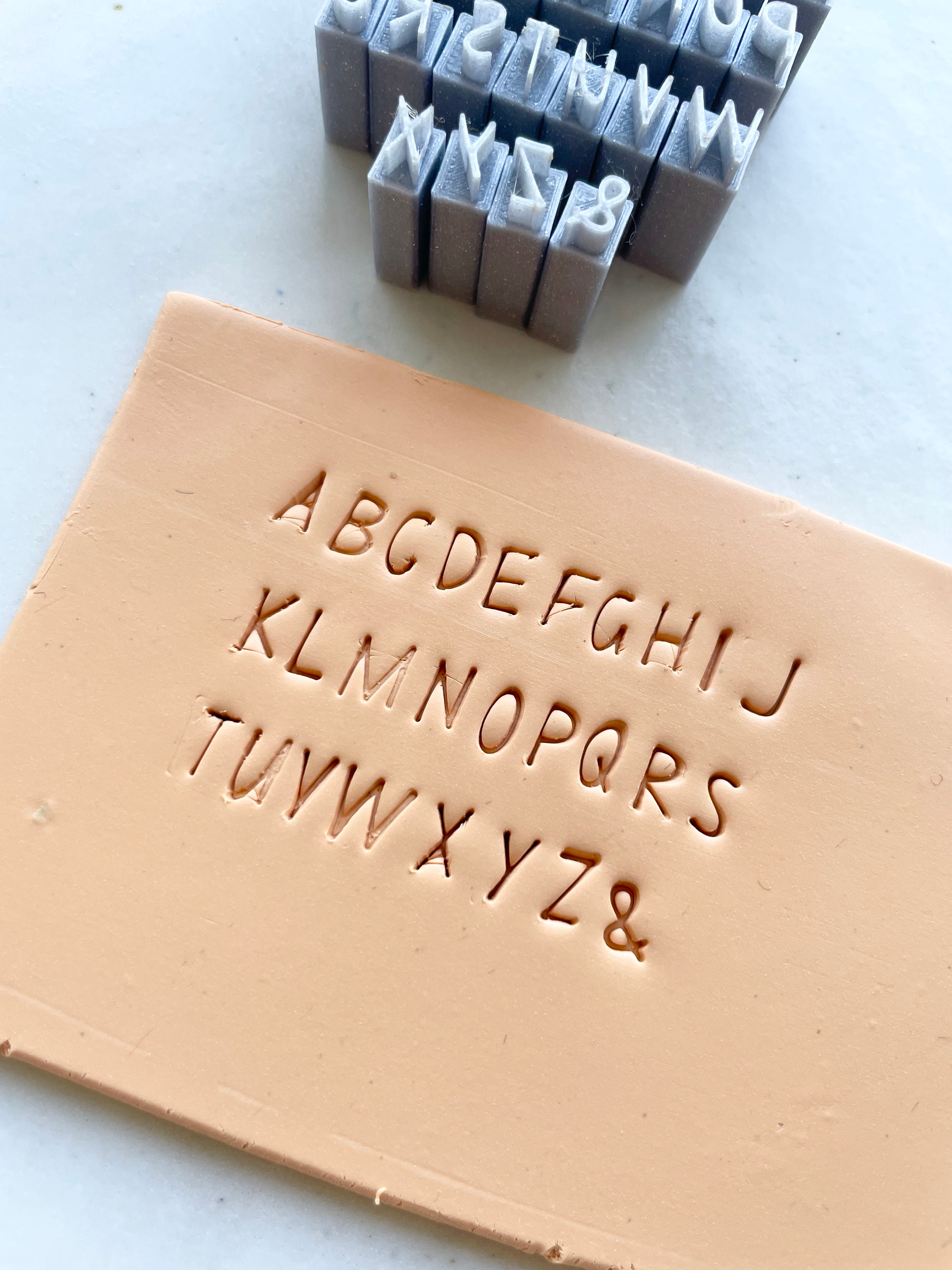 Alphabet Pottery Stamp Set Groovy Font from the May 2023 mystery box