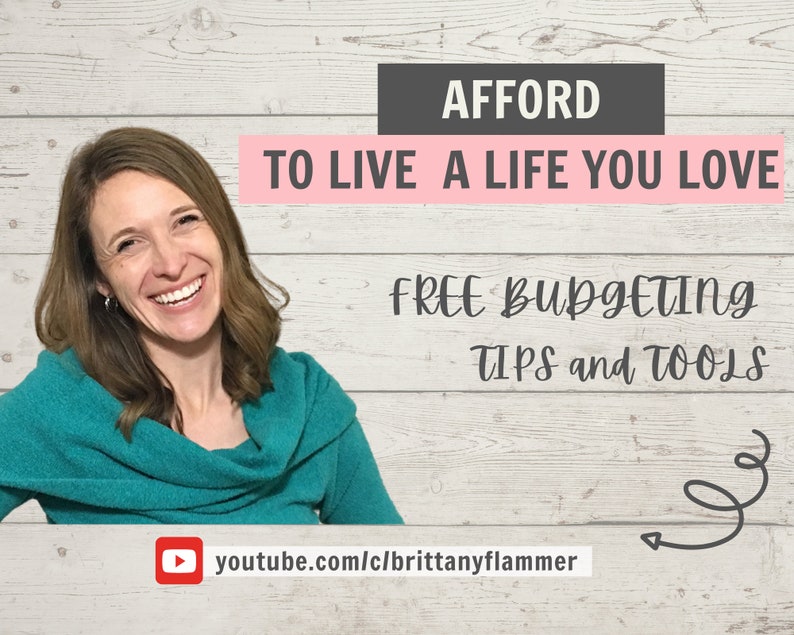May include: A woman smiles and looks at the camera. The text "AFFORD TO LIVE A LIFE YOU LOVE FREE BUDGETING TIPS and TOOLS" is displayed in pink and black text on a white wood background. A YouTube logo and the URL "youtube.com/c/brittanyflammer" are displayed at the bottom of the image.