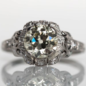 Circa 1930s Art Deco Platinum 1.60ct Old European Cut Diamond Engagement Ring with .15cttw Side Stones - VEG#714