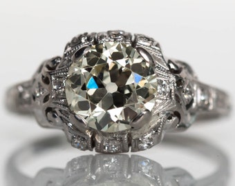 Circa 1930s Art Deco Platinum 1.60ct Old European Cut Diamond Engagement Ring with .15cttw Side Stones - VEG#714