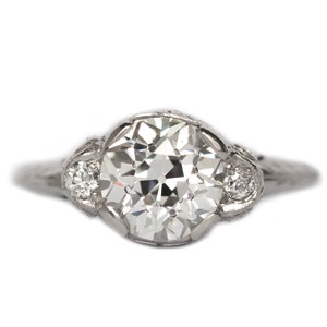 Circa 1910 Edwardian Platinum GIA Certified 1.64ct Old European Brilliant Cut Diamond Engagement Ring with .06cttw Side Diamonds - VEG#1304