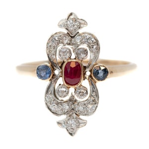 Circa 1910s Ruby, Diamond, Sapphire crafted in Two-Tone Gold & Platinum Shield Ring, ATL #442B