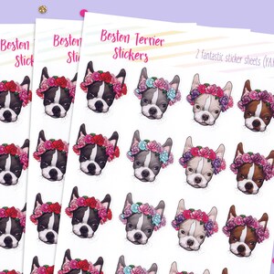 May include: Two sheets of stickers featuring Boston Terrier dogs wearing flower crowns. The dogs are depicted in various colors and poses, with pink, purple, and blue flowers.