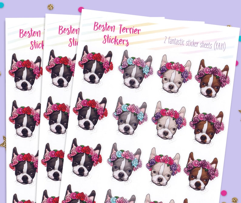 May include: Two sheets of stickers featuring Boston Terrier dogs wearing flower crowns. The dogs are depicted in various colors and poses, with pink, purple, and blue flowers.