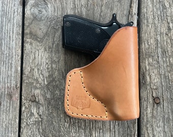 Wyprodukowano w USA Beretta Bobcat 21A Covert Taurus PT 22 Beretta Tomcat Ręcznie robiona skórzana kabura kieszonkowa - broń i/lub amunicja nie są dołączone