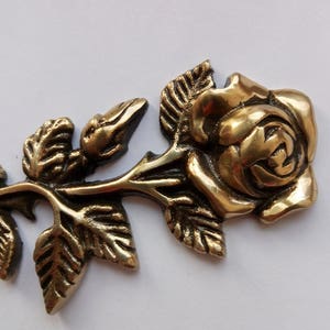 Grave top decoration made of natural casted brass. It varnished with transparent protective lay to avoid stains and rust. So the piece works good outdoor.