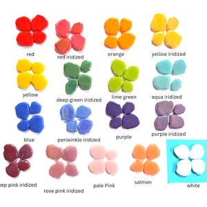 May include: A collection of small, smooth glass pieces arranged in groups of four, labeled by color and finish including red, red iridized, orange, yellow iridized, yellow, deep green iridized, lime green, aqua iridized, blue, periwinkle iridized, purple, purple iridized, deep pink iridized, rose pink iridized, pale pink, salmon, and white.