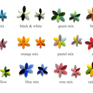 May include: Assortment of 12 small flower-shaped mosaic tiles in various color combinations, including turquoise, black and white, green, brown, lilac, orange, pastel, red, green and yellow, blue, rose, and rainbow.