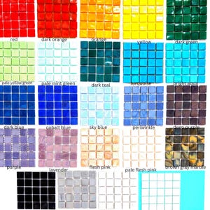 May include: A collection of square glass mosaic tiles arranged in a grid, featuring a wide spectrum of colors including red, orange, yellow, green, blue, purple, pink, brown, gray, black, and white, with labels identifying each color group.