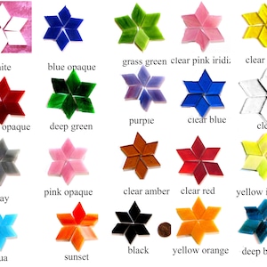 May include: Assortment of 18 glass mosaic tiles in various colours and finishes, including clear, opaque, and iridescent. Each tile is shaped like a six-pointed star.