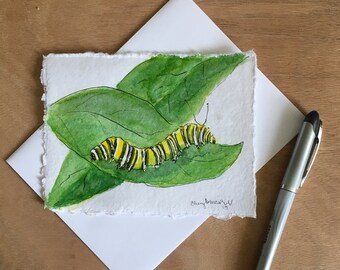 This Monarch Caterpillar on a milk weed leaf is perfect for a Spring or Summer birthday.  Hand-painted card watercolor card approx. 4.5"x6".