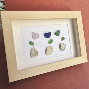 Sea glass art 9: cobalt blue, lavender, teal sea glass flowers in patterned sea glass pot/vases, birch 3x4 shadowbox frame, sea pottery art