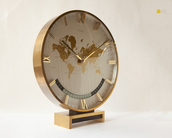 XL KIENZLE WORLD Horloge Allemagne Bauhaus Table de bureau Milieu du siècle  Art Déco Laiton Manteau moderne mcm Heinrich Moller -  France