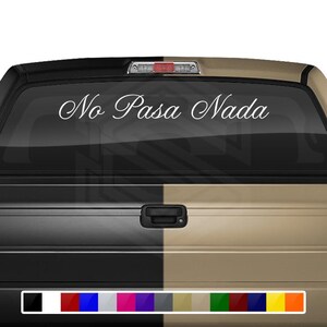 May include: A white decal with the text "No Pasa Nada" on the back window of a black and tan pickup truck. The decal is available in a variety of colors.
