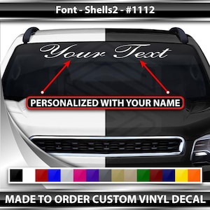 May include: White vinyl decal with the text "Your Text" in a cursive font. The decal is designed to be placed on the windshield of a car. The text "PERSONALIZED WITH YOUR NAME" is also included on the decal.