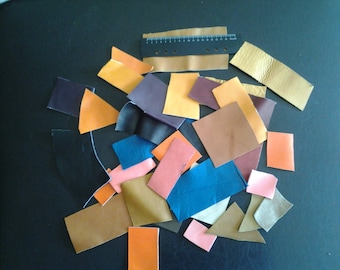 over 20 different color leather scraps