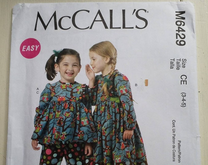 McCall's M6429 girls winter dress and ruffled pants pattern