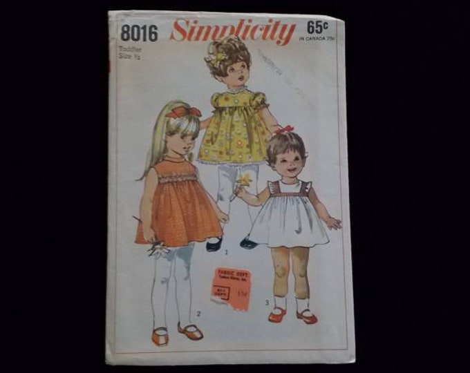 Vintage Simplicity child size 1/2  dress sewing pattern. Uncut