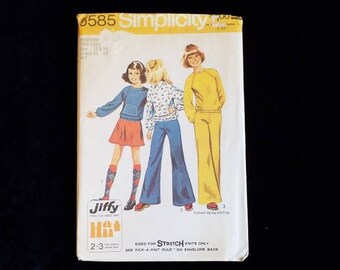 Vintage Simplicity 6585 child's Jiffy top, short skirt, and bell-bottom pants sewing pattern.  New UNCUT