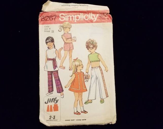 Vintage Simplicity girls dress, pants, and top sewing pattern child size 4
