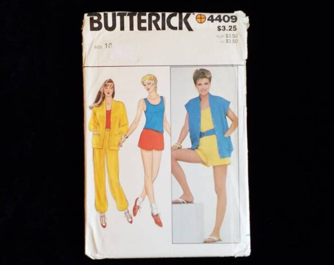 Vintage Butterick 4409 ladies jacket, vest, top, pants, and shorts sewing pattern.  Uncut. Size 18