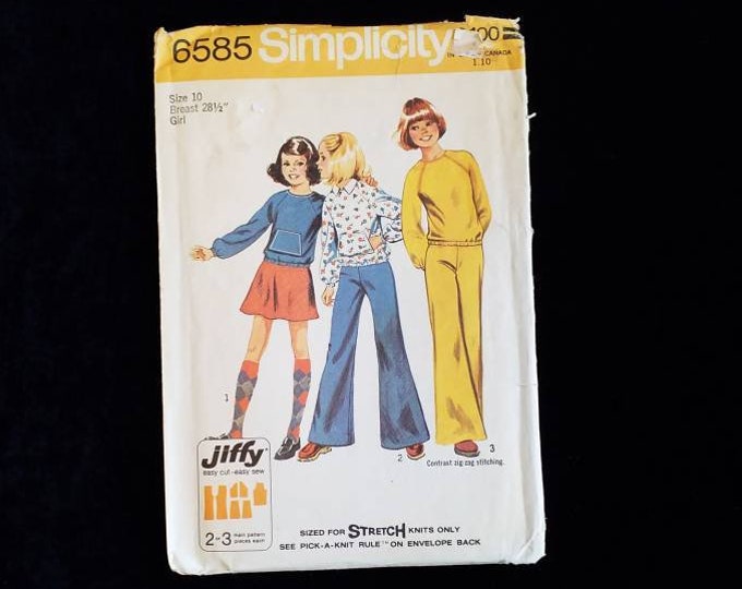 Vintage Simplicity 6585 child's Jiffy top, short skirt, and bell-bottom pants sewing pattern.  New UNCUT