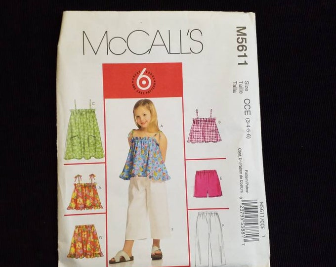 McCall's M5611 girls halter top, shorts, and pants sewing pattern.  New Pattern