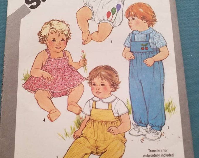 vintage newborn size overalls, sundress, and bloomers sewing pattern. New old stock