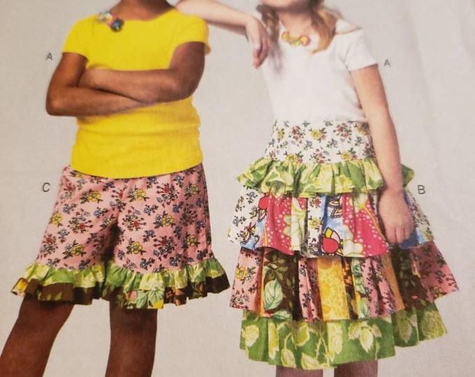 Butterick girls fancy Nancy skirt and bloomers sewing pattern size 6,7,8