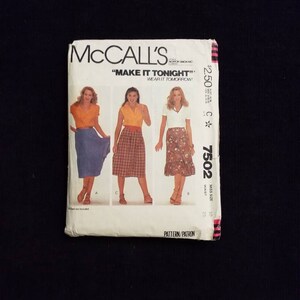May include: McCall's sewing pattern envelope for a skirt, featuring three women wearing different versions of the skirt. The pattern number is 7502 and the text on the envelope reads "Make it Tonight! Wear it Tomorrow!"