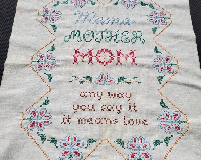 Vintage cross-stitch Sampler. Mom