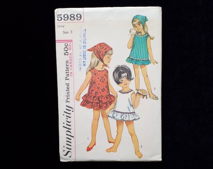 Vintage Simplicity child size 3 play dress, panties and scarf sewing pattern. Uncut