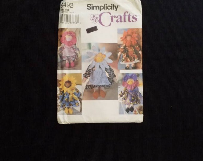 Vintage stuffed flower girl doll sewing pattern.  Simplicity Crafts 9492.  Sunflower girl.