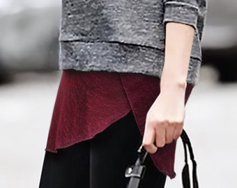 Xale Isabella da Beet Web: Extensor de blusa de malha rubi, faixa para o quadril ideal para exercícios.