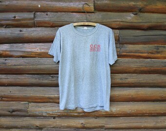 Camiseta vintage gris de escuela universitaria de educación física C.C.S., con costuras sencillas, talla XL (talla M) para adulto