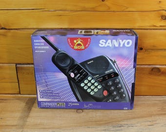 Teléfono inalámbrico con altavoz y doble teclado Sanyo Vintage, nuevo en caja abierta.