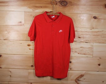 Maglietta vintage Nike con stampa Swoosh rossa sul petto, punto singolo, taglia media per adulti