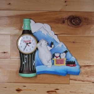 Reloj colgante de pared con temática de osos polares de Coca-Cola vintage, 1997
