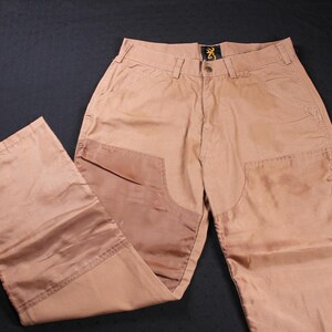 Vintage Browning Hunting Outdoors Pantalon double genou beige havane, taille adulte 34 x 32