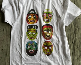 T-shirt graphique blanc rétro avec masque d'halloween