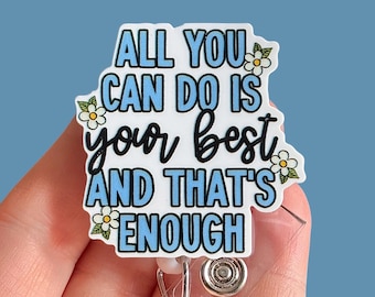 May include: White badge holder with a blue and white floral design. The text reads "All you can do is your best and that's enough".