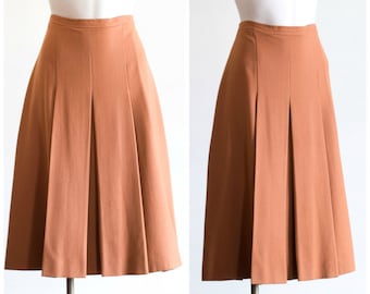 1970s burnt orange pleated skirt