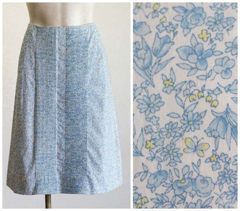 A-line skirt with blue and yellow flower and butterfly print and pintucked front