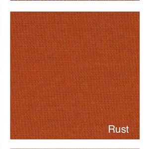 May include: Close-up of three fabric swatches in shades of brown and orange. The top swatch is cinnamon, the middle is rust, and the bottom is terracotta. Each swatch has a textured weave.